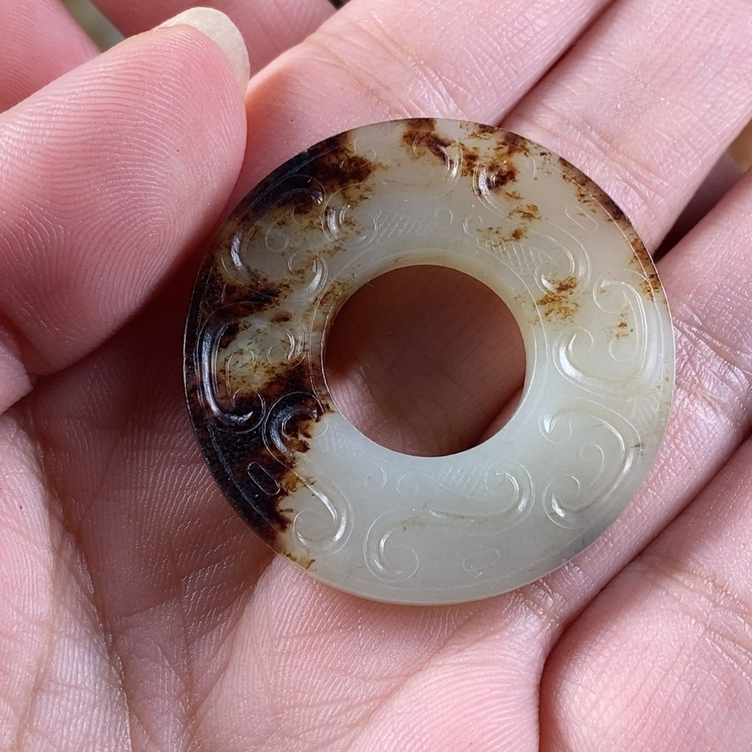 浪***_和田玉未镶嵌挂件