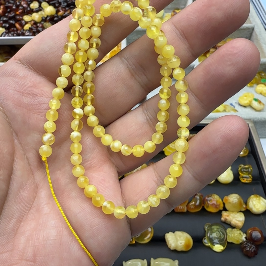 V***_琥珀未镶嵌裸石5克4mm