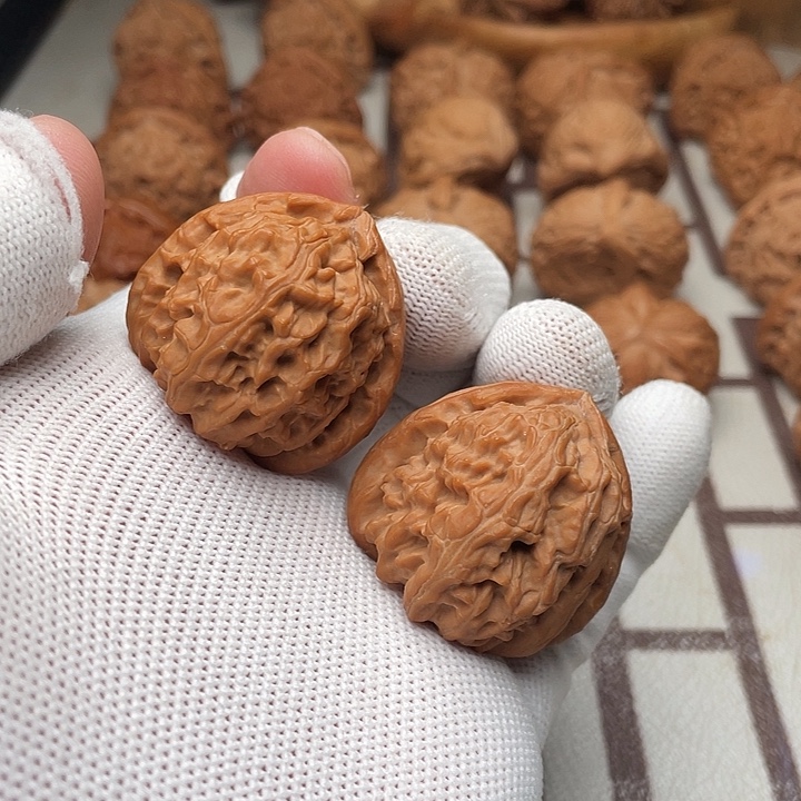 文玩核桃把件三角白