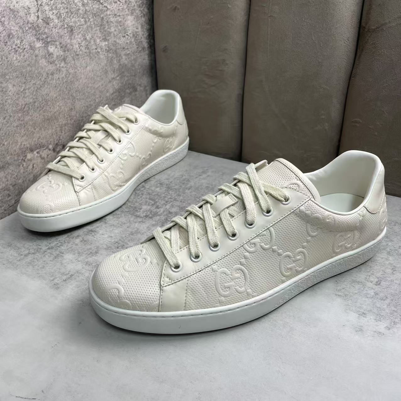 95新 GUCCI/古驰 米白色皮革双G浮雕时尚舒适休闲板鞋/44码