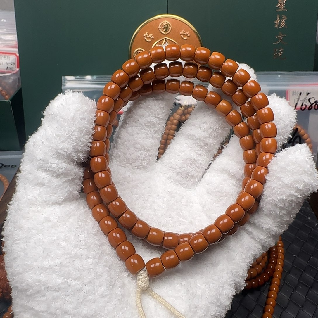 橄榄核吊坠8.2mm老挝直切正三花面无白核尖长串收藏级