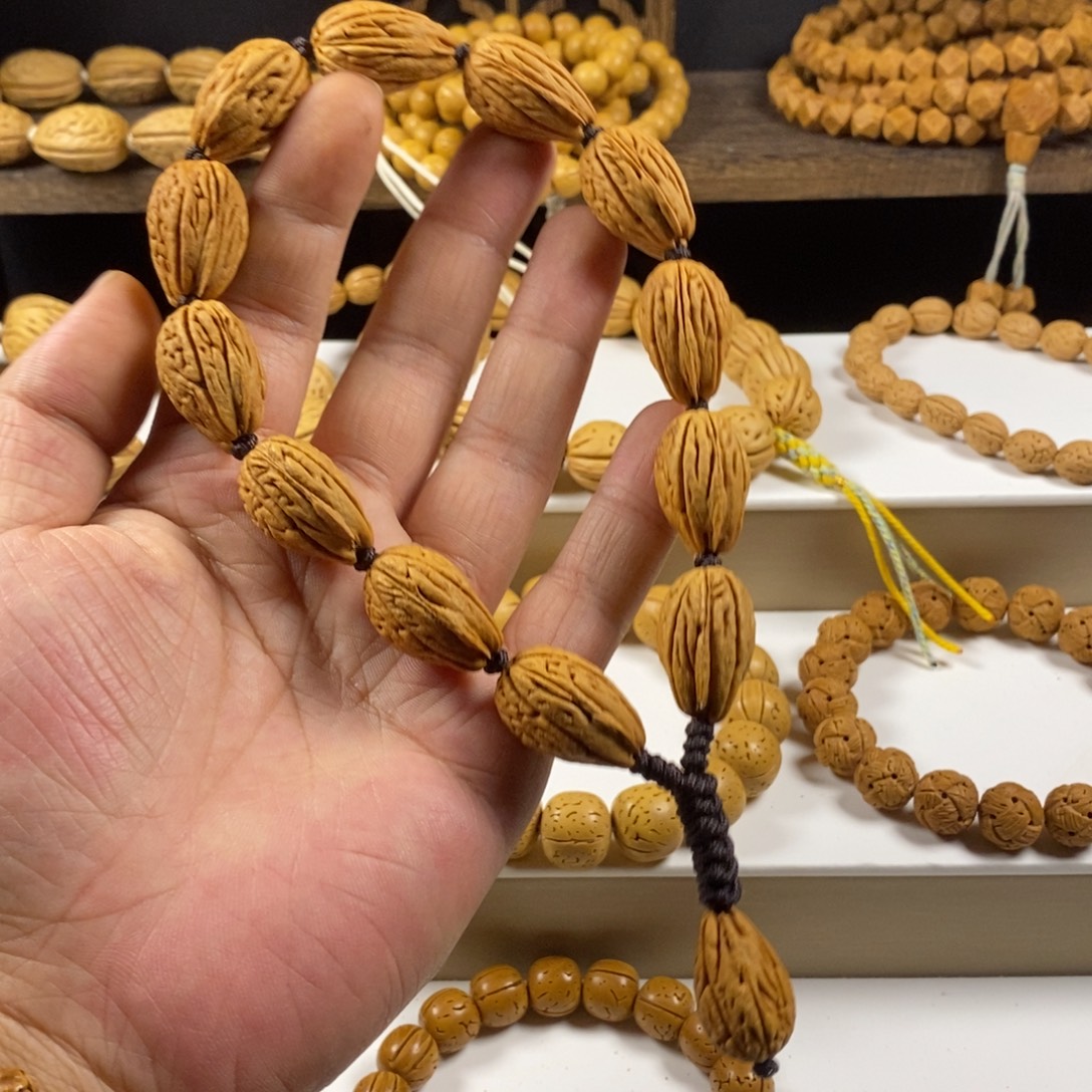 就***了桃核吊坠宽旗钱袋子原皮手持