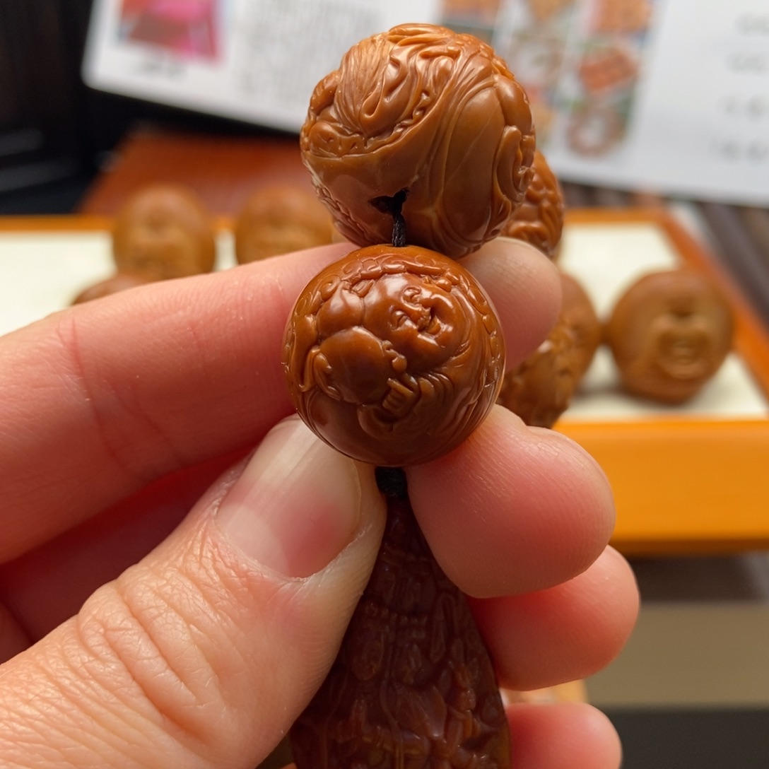 橄榄核把件S****d纯手工核雕