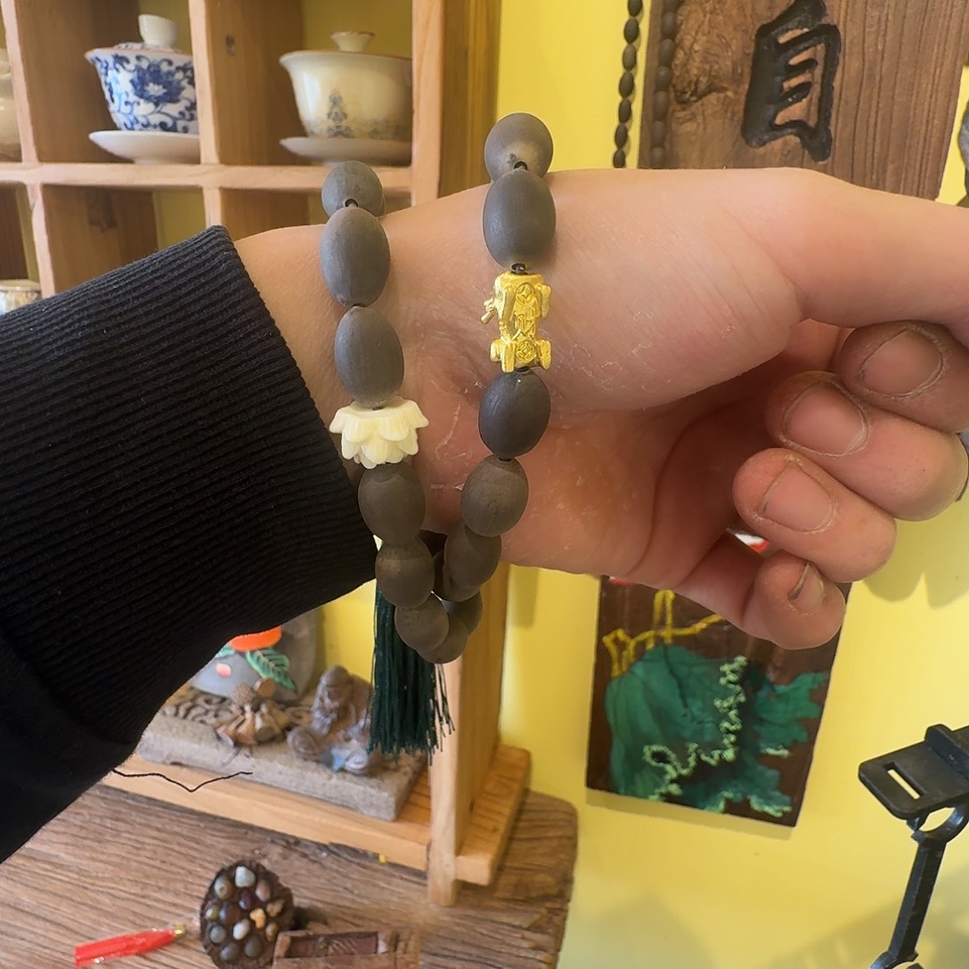 静***慈莲子手持一个包邮