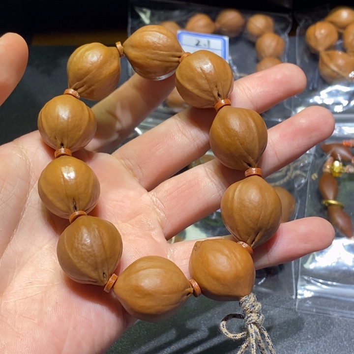 橄榄核吊坠梅林正三花