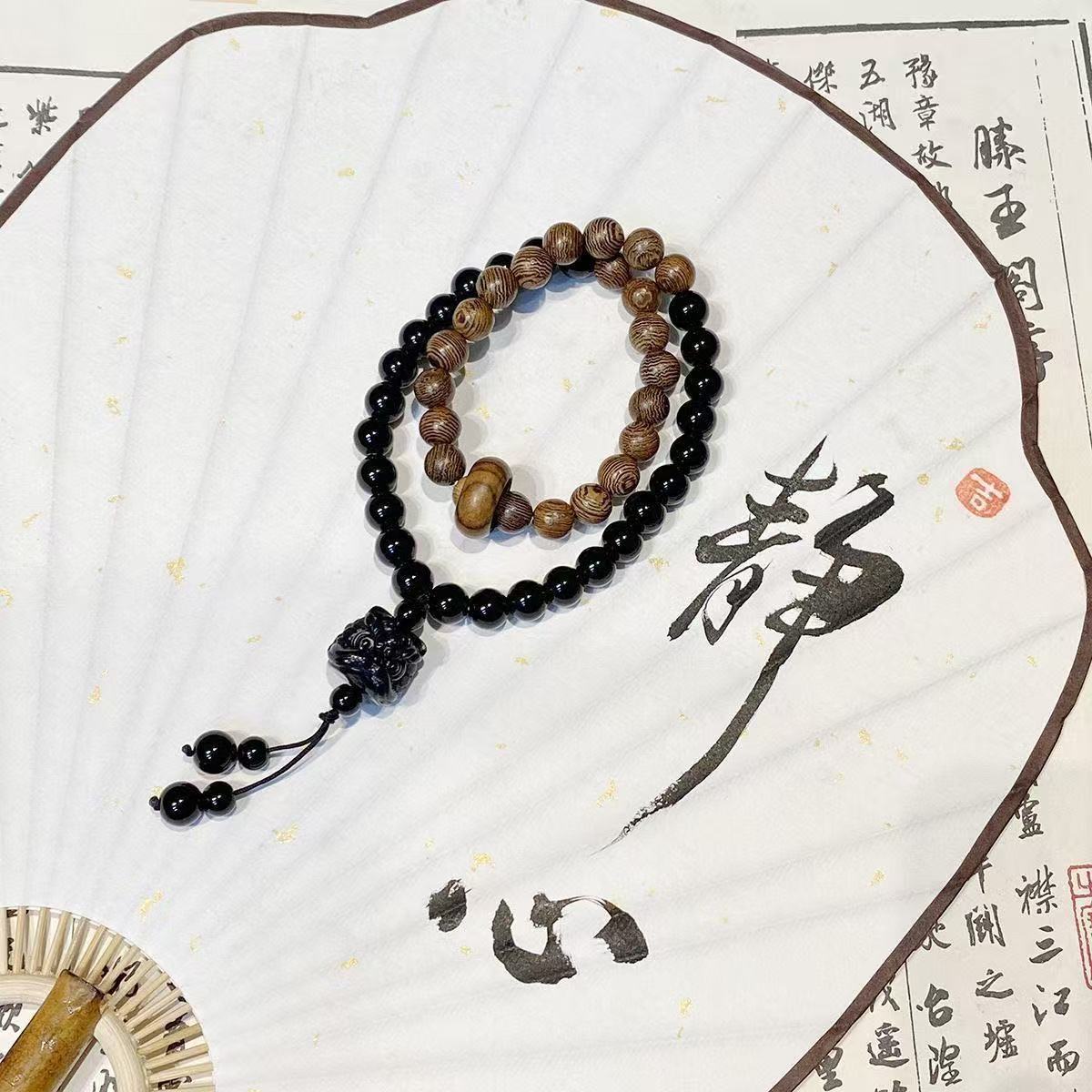 M003双圈醒狮吊坠带跑环