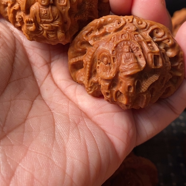 嘻***嘻文玩核桃把件佛窟