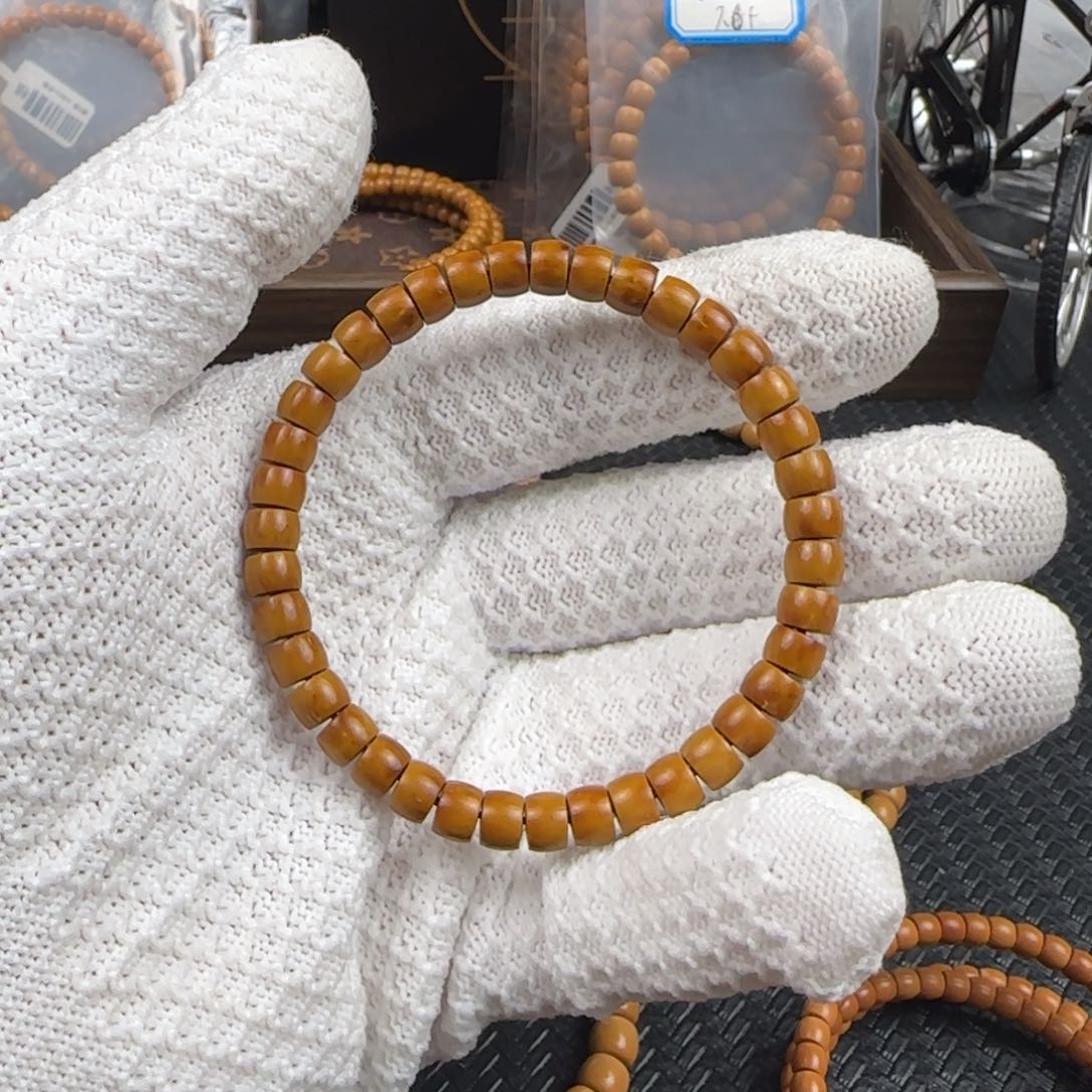 橄榄核吊坠7.0mm纯肉紫金鼠直切单圈