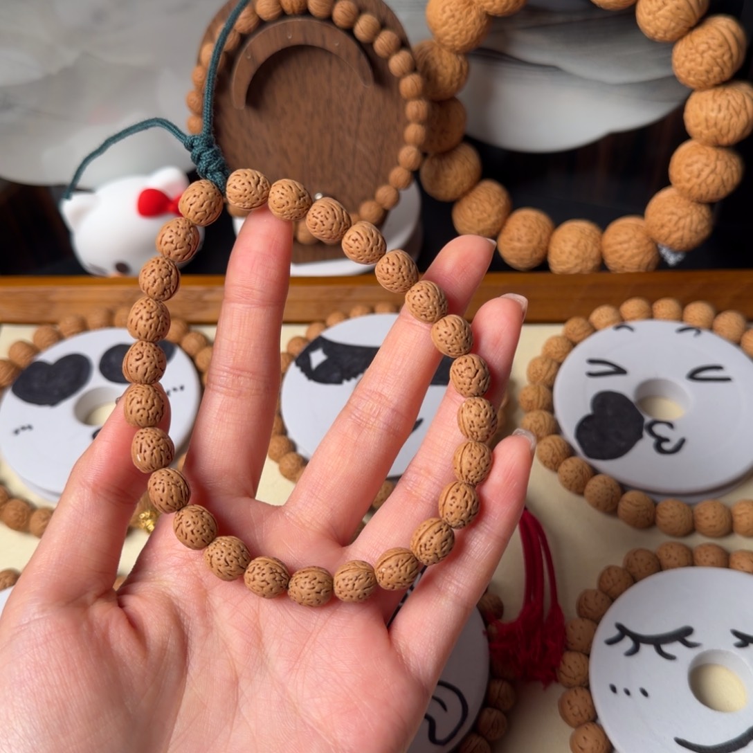 大***范野生钱袋子桃核吊坠