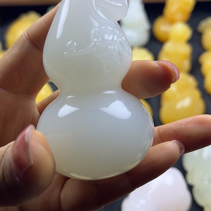 过***程大理石磁石昆仑玉石手把件