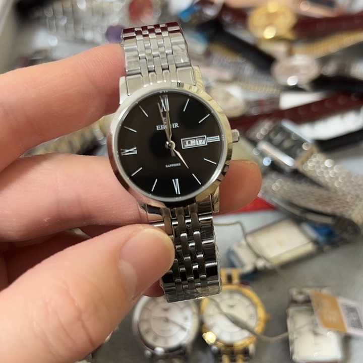 芳****钢牛皮（革）钢石英机芯