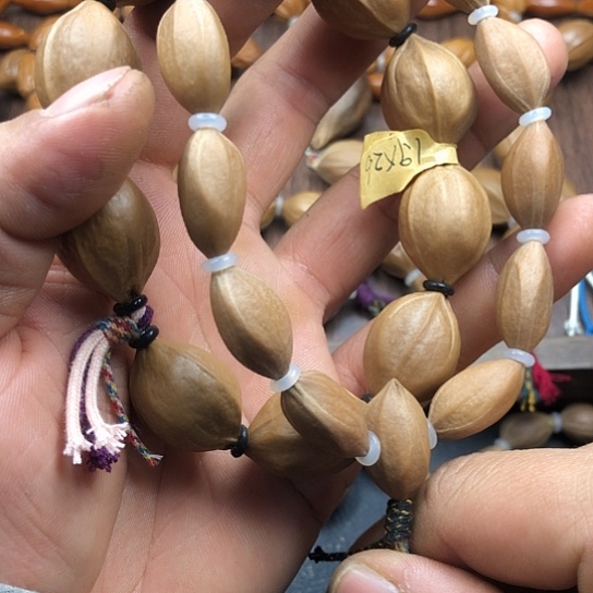 李***虎橄榄核吊坠他来咯哦哦哦