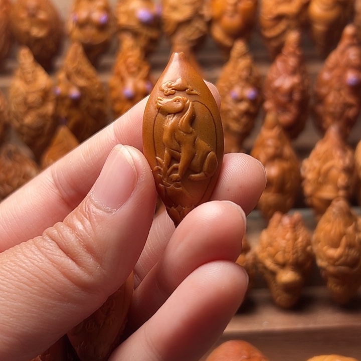 渡***.橄榄核吊坠橄榄核