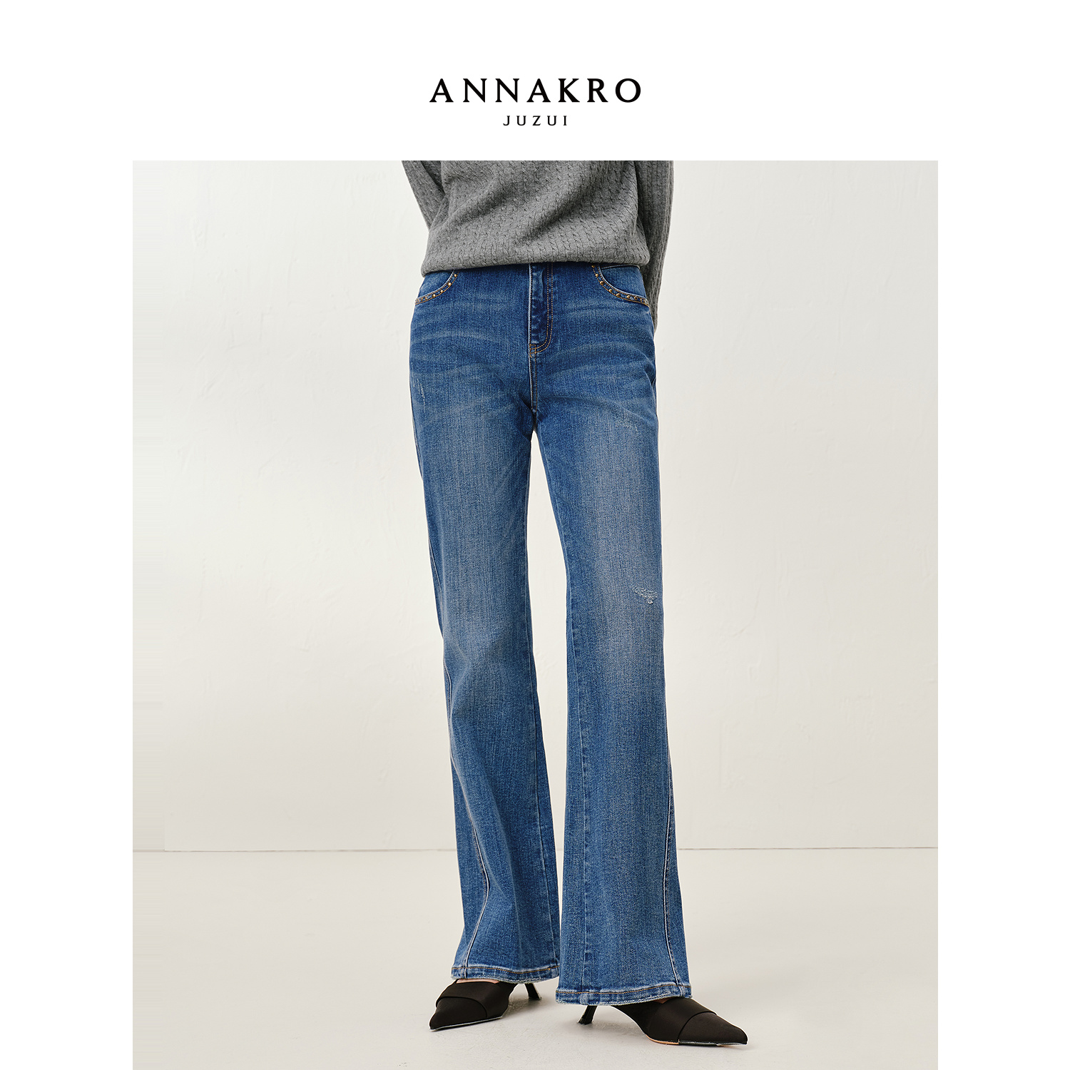 【丽公主专属】玖姿·安娜蔻KWFQ12113个性铆钉牛仔微喇裤修身长裤女