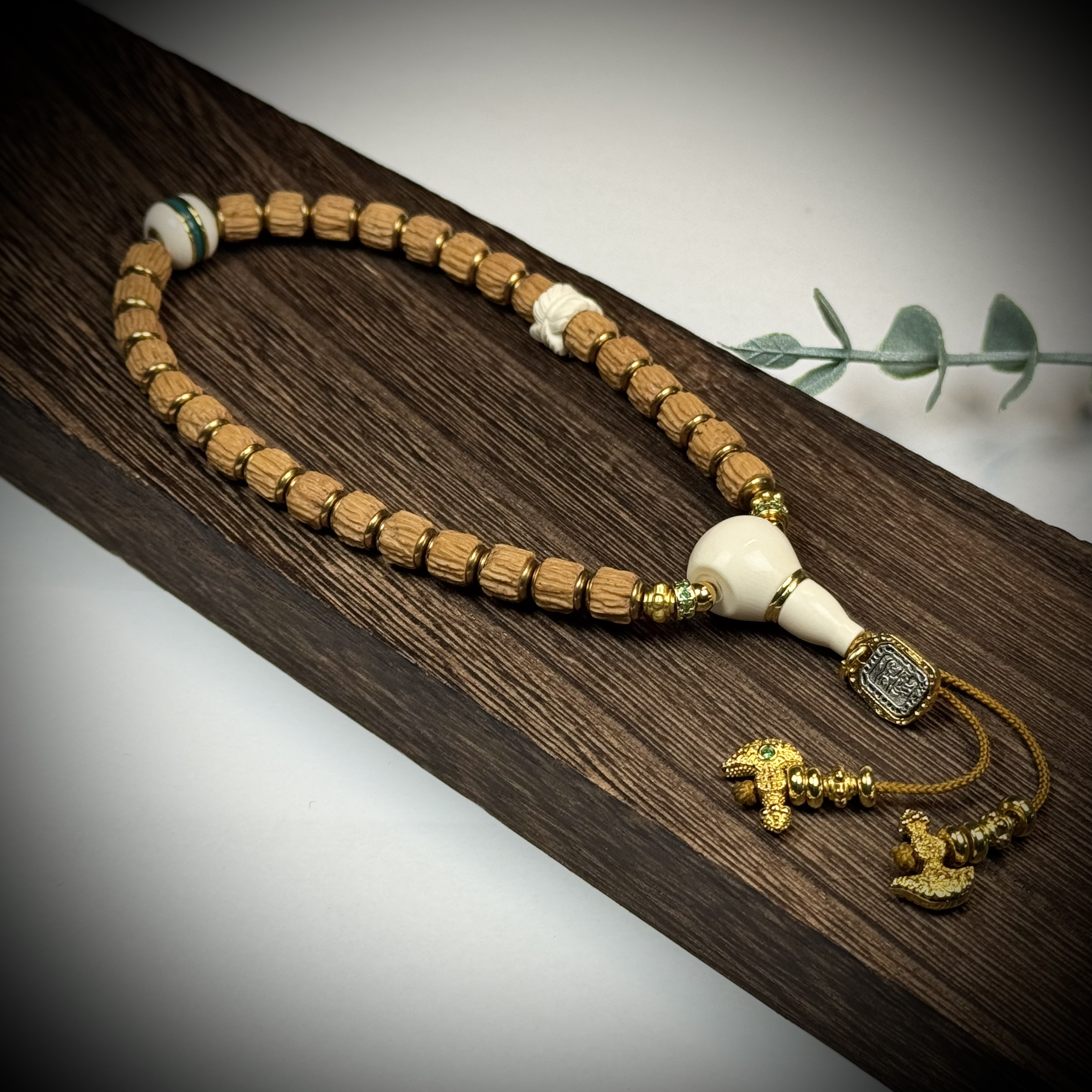 Q42-48风羽金盾热振百香籽手持约7mm