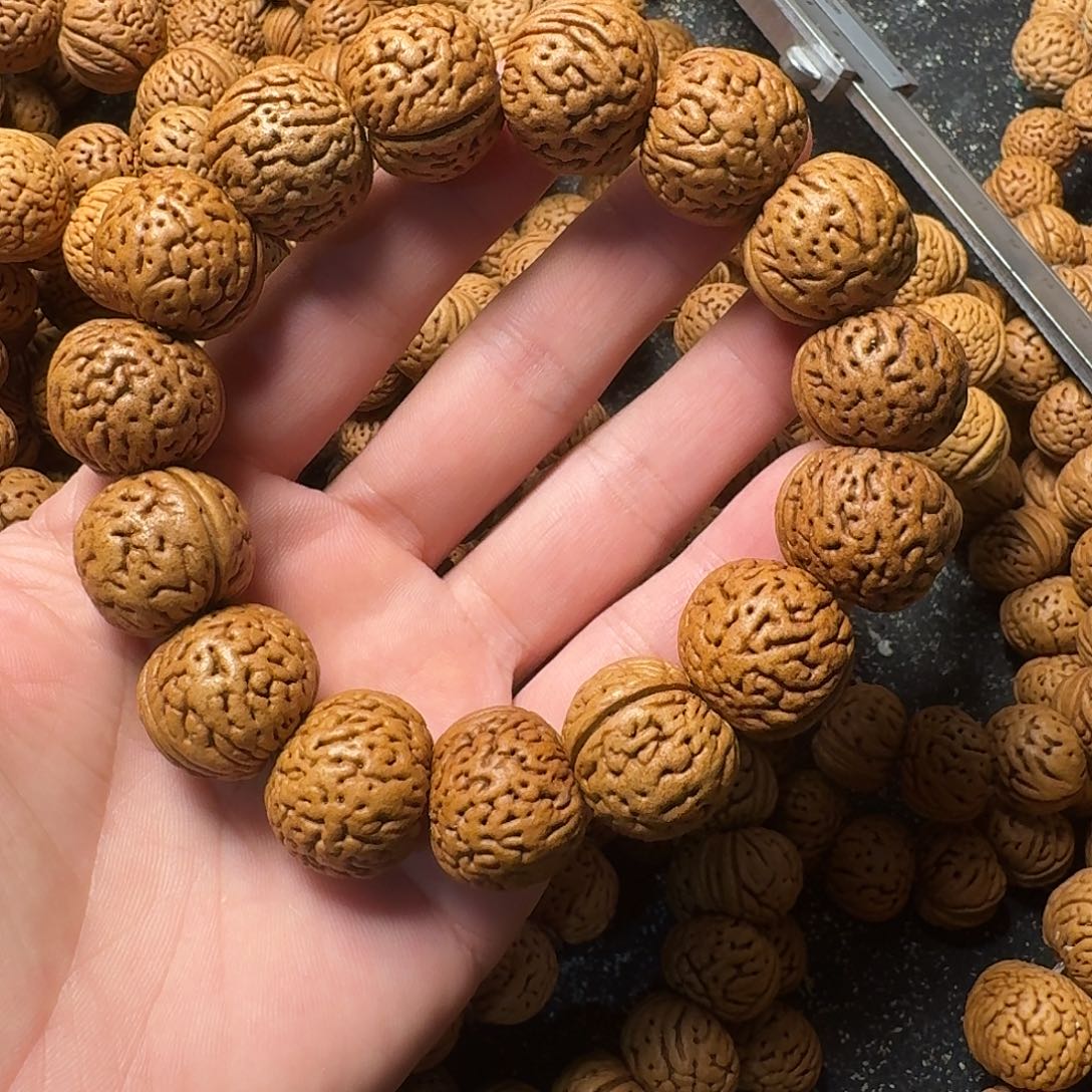 无***嘴桃核吊坠苹果园手串