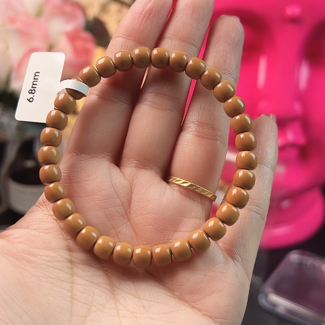 橄榄核手串麻*老挝核尖单圈红料子