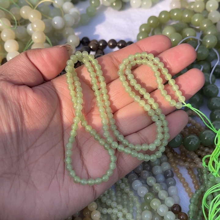 和田玉挂件18K金镶嵌