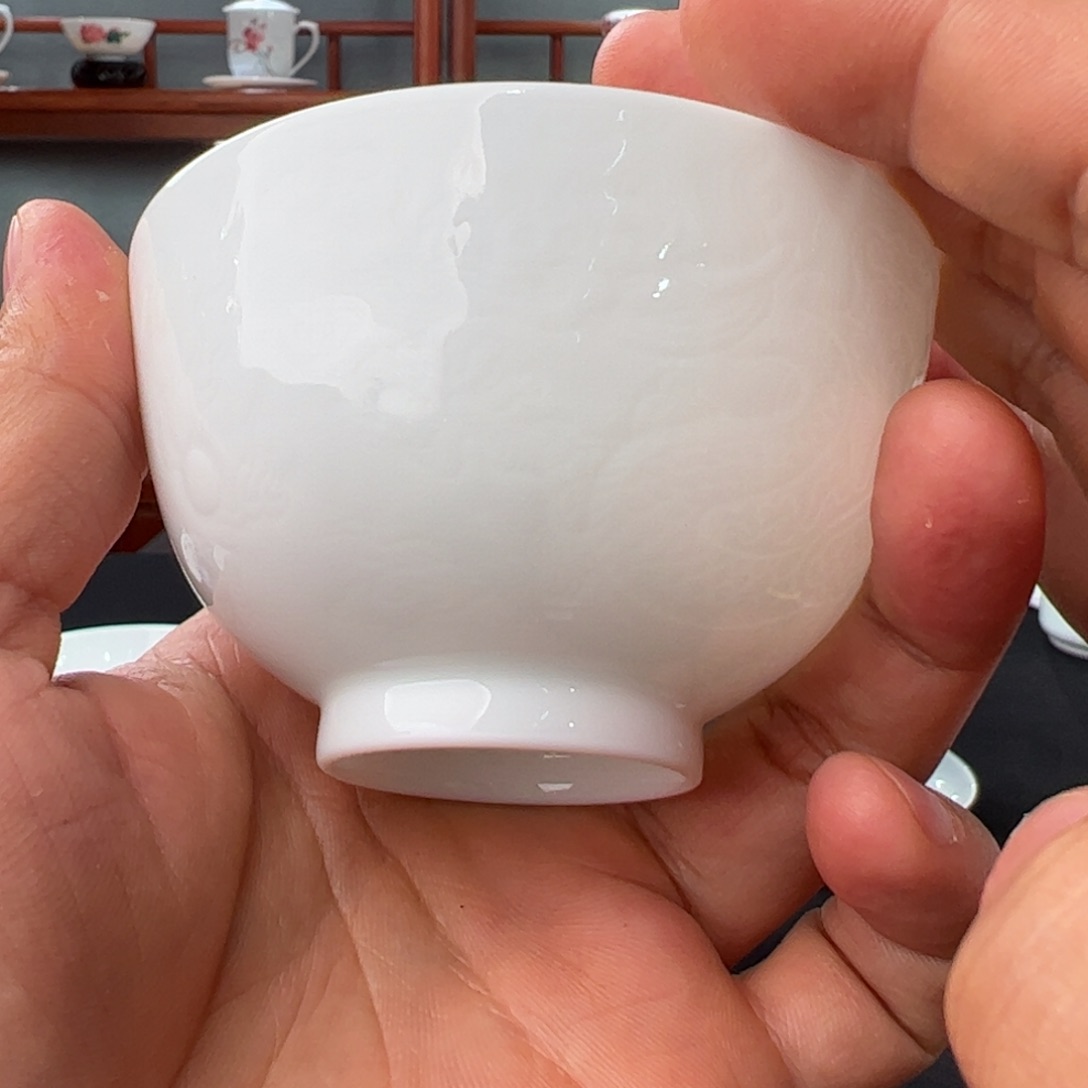 柴窑素胎半刀泥龙纹变形