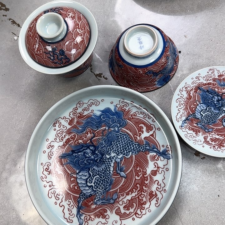 瓷片釉里红麒麟踏浪4件套