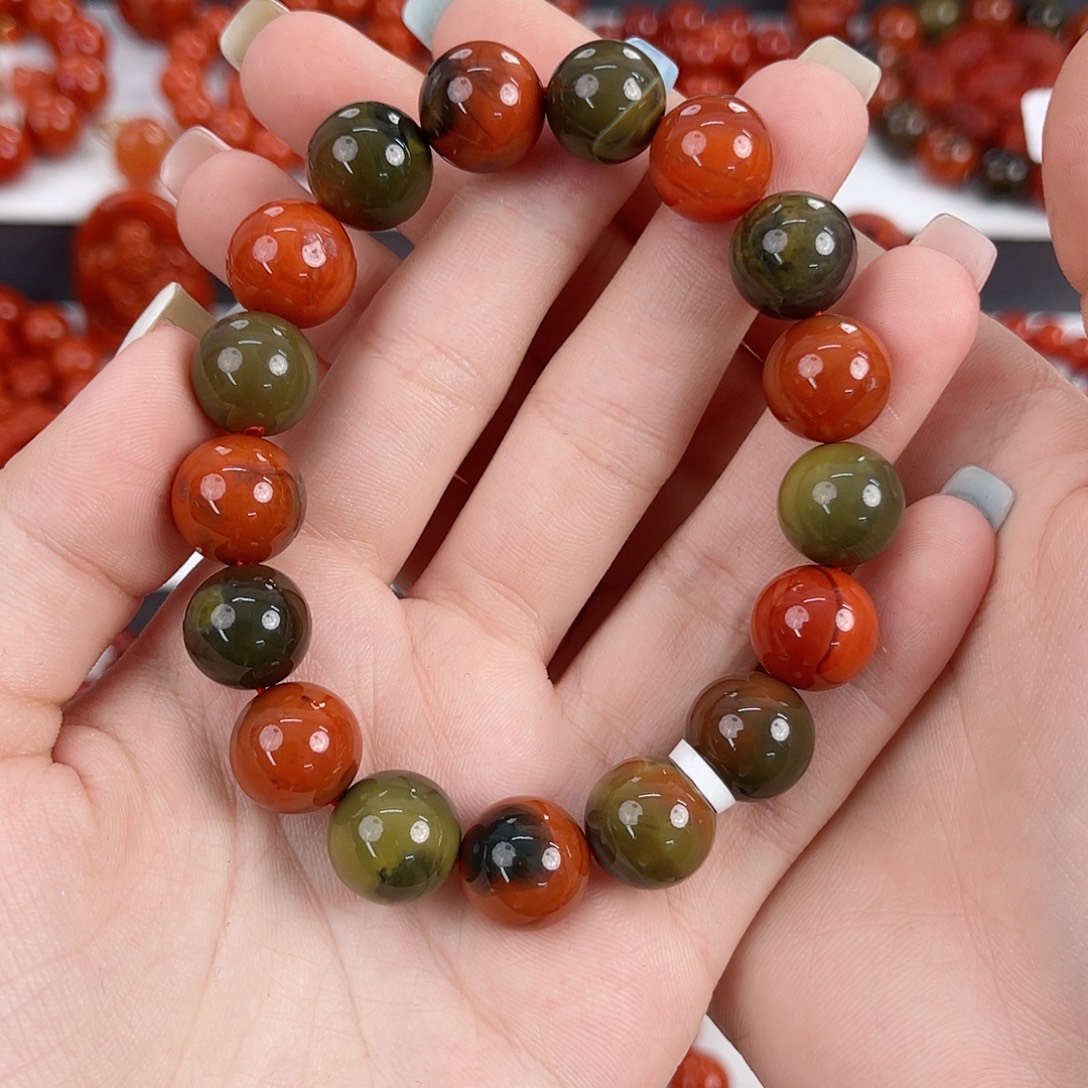 随***看南红玛瑙未镶嵌大山包摆件12mm手串