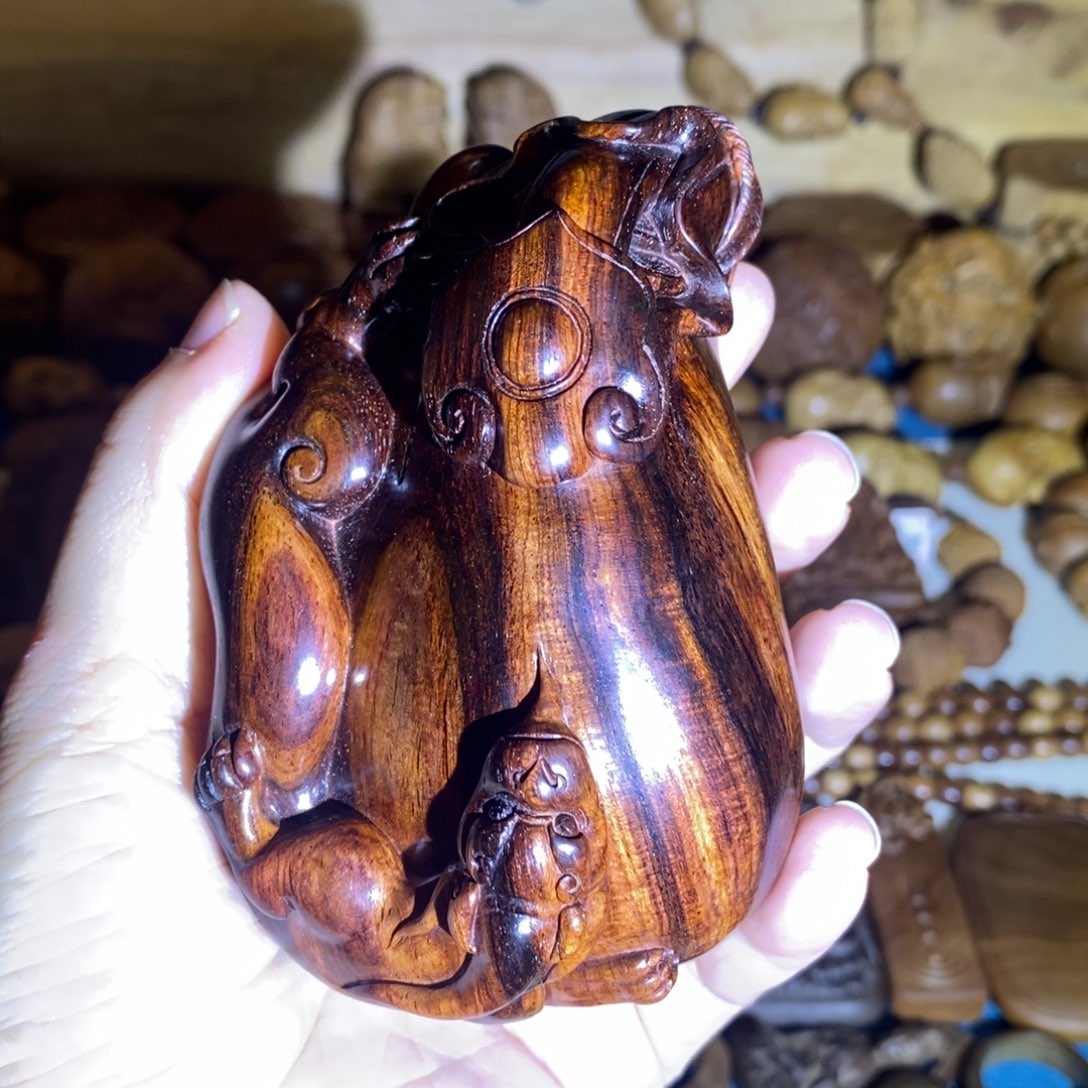 凉***风把件黄花梨/降香黄檀海南黄花梨如意螭龙钱袋