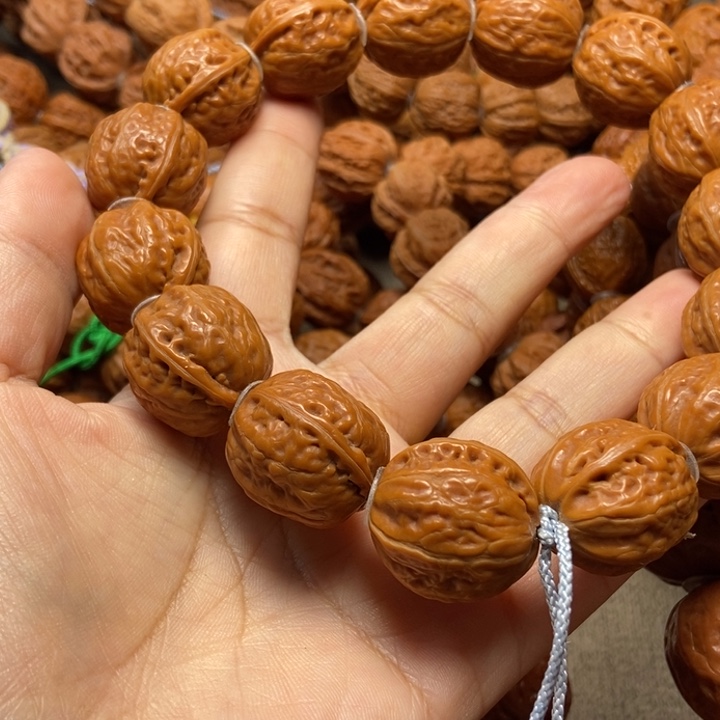 文玩核桃吊坠小**?光头手串