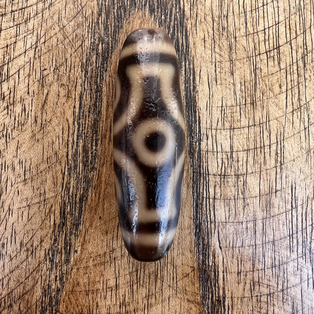 曲贡牙黄系列金刚十字六眼天珠油润巴西玛瑙自然风化纹