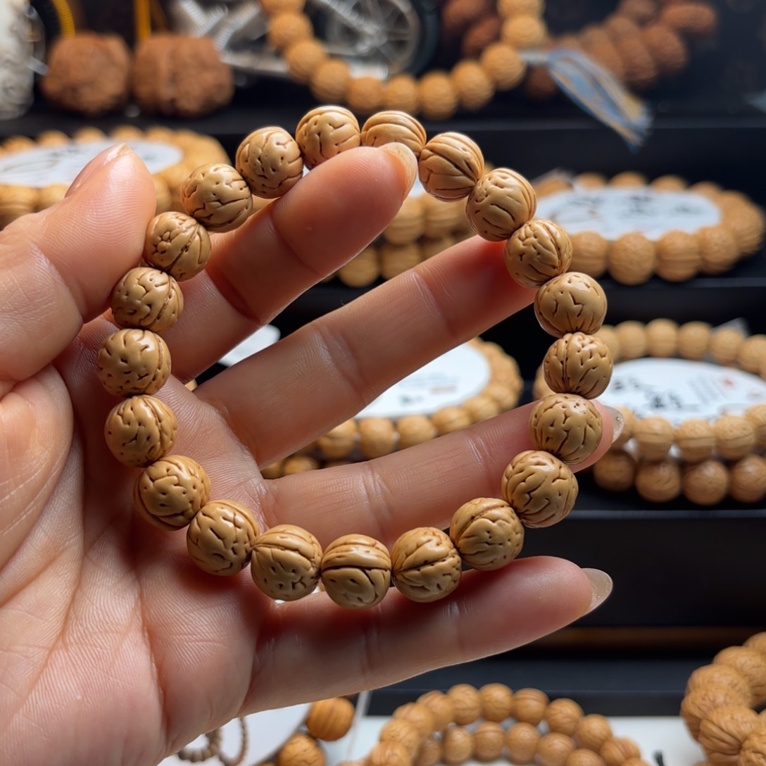 失***态菩提籽类盘锦野生小黄桃桃核手串