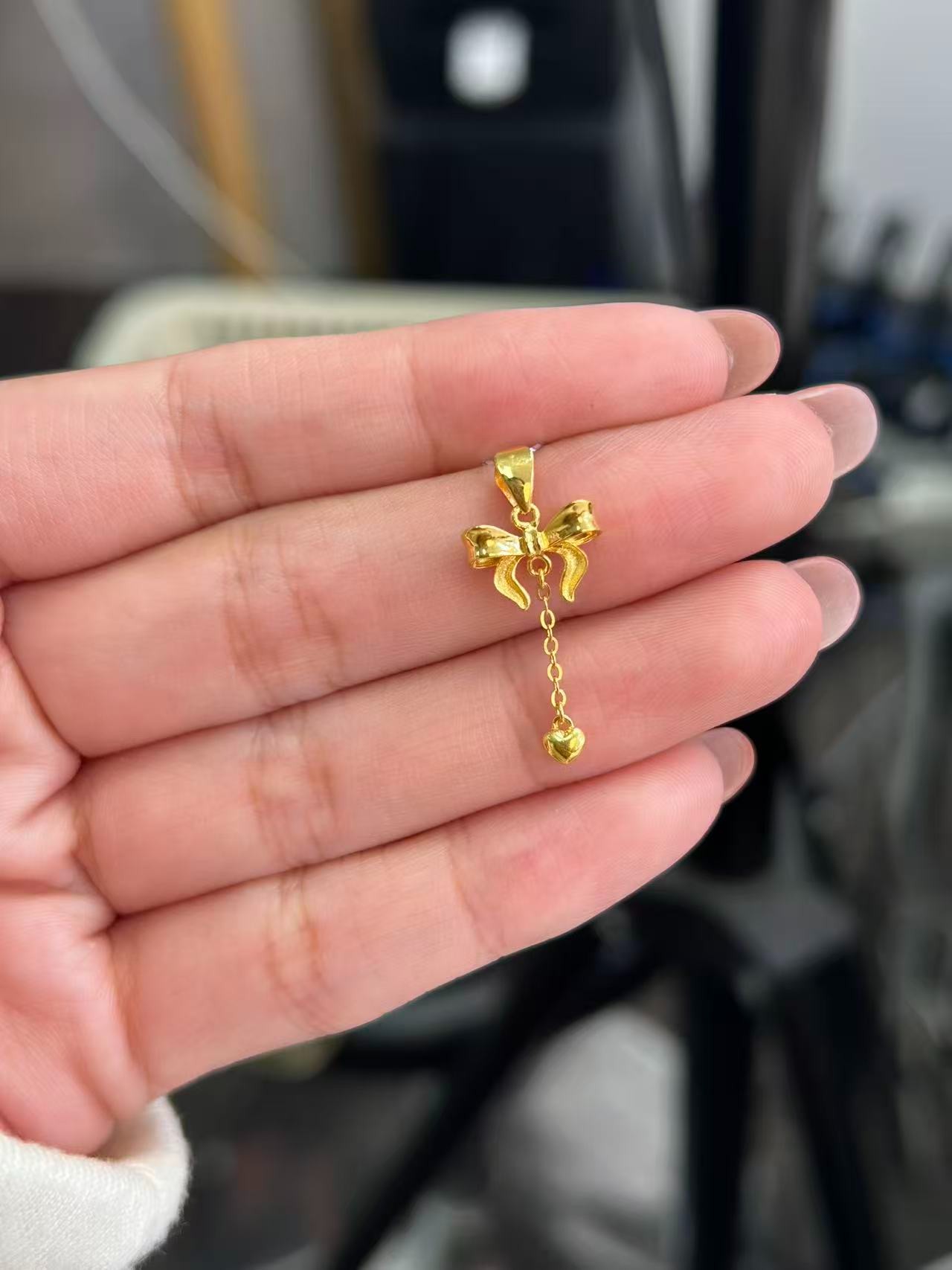 足金999 迷你在逃蝴蝶结吊坠