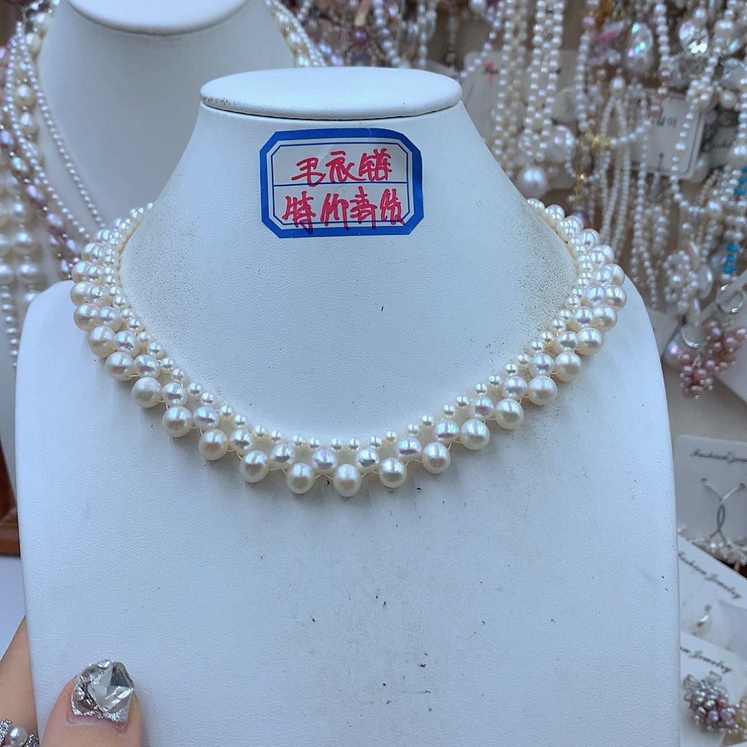 Q***.淡水珍珠耳饰银S925镶嵌