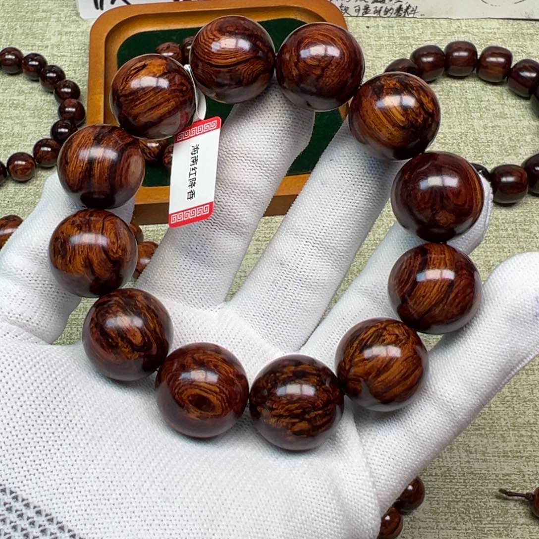 木宇****士海南红降2.0单圈