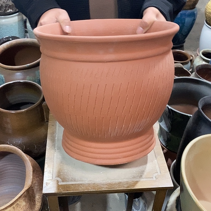 口30高度29红陶………