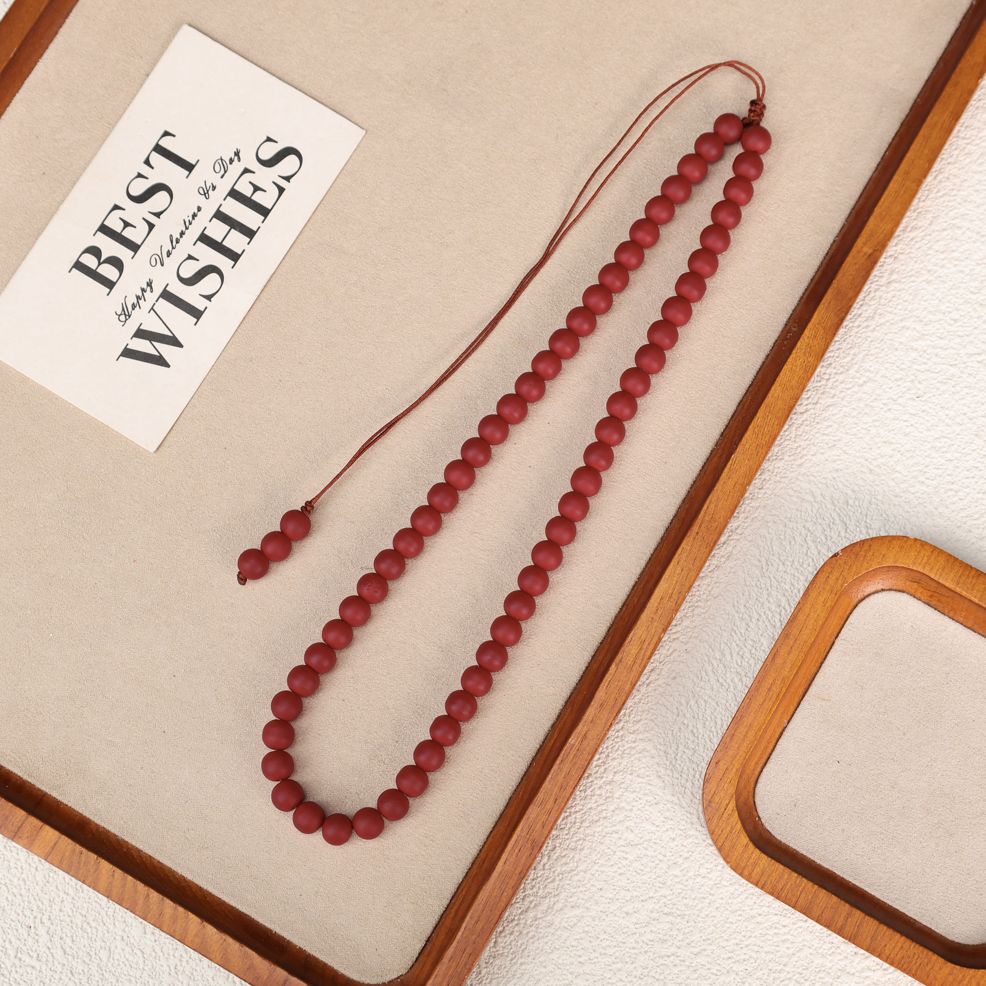 LZ4905枣红色磨砂圆珠绳编琉璃项链