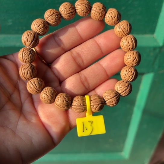 木质野生桃核手串