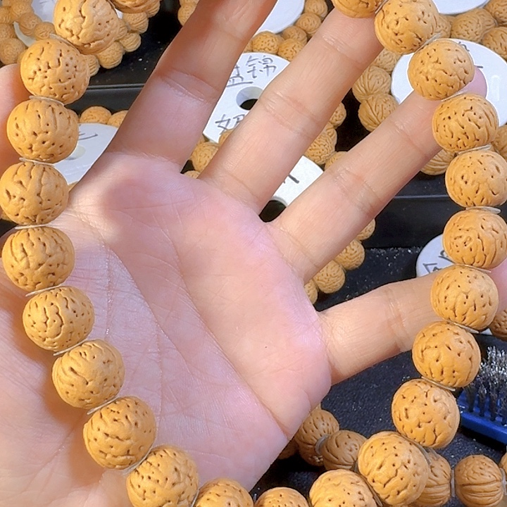 笑***狂桃核吊坠金丹桃核手持