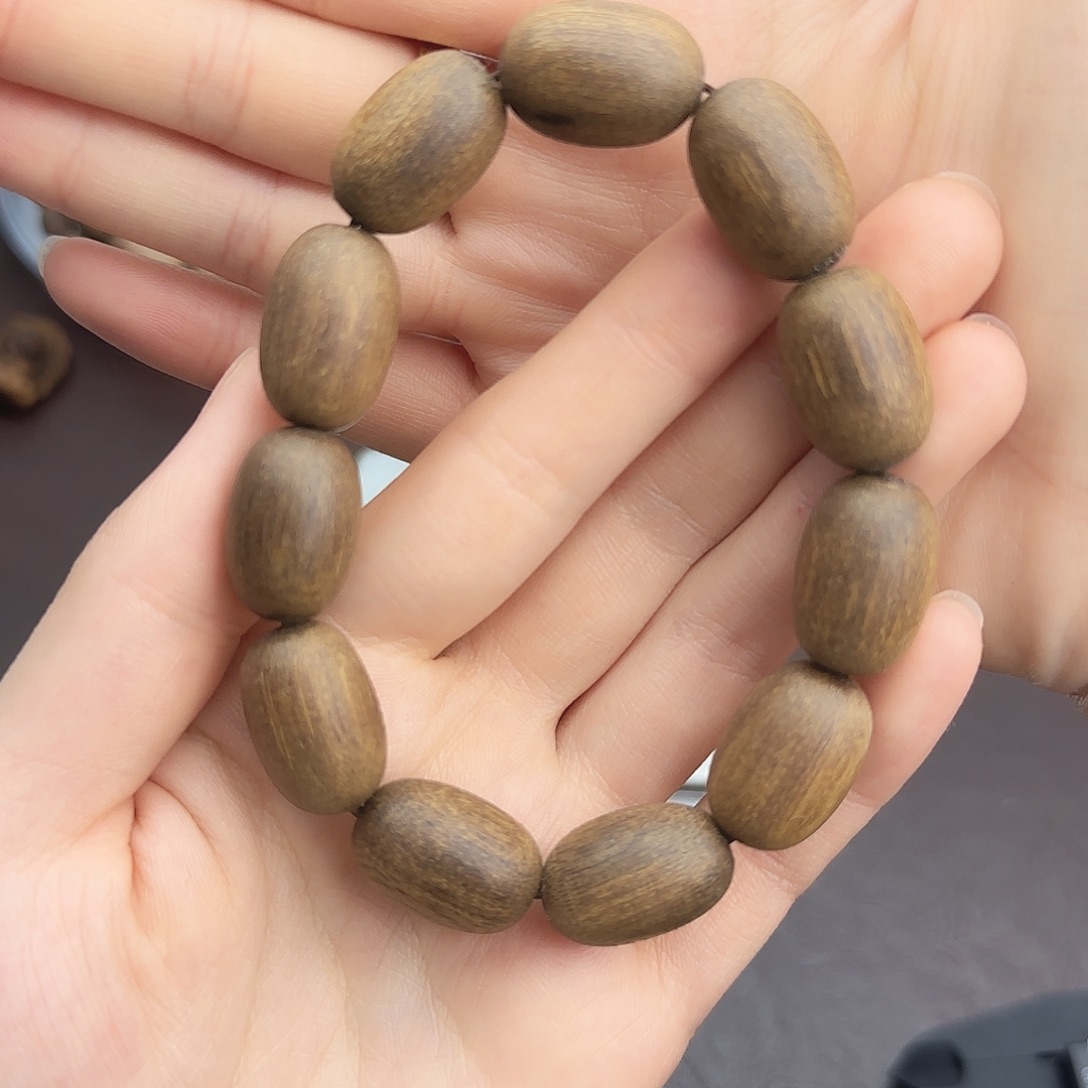 金丝秘结黄奇楠枣核珠