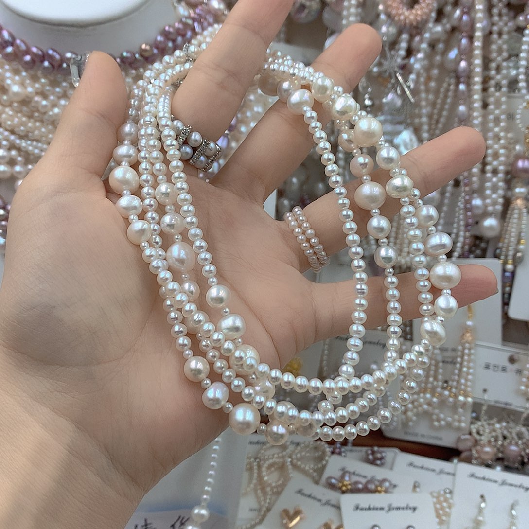 敏***言淡水珍珠耳饰银S925镶嵌