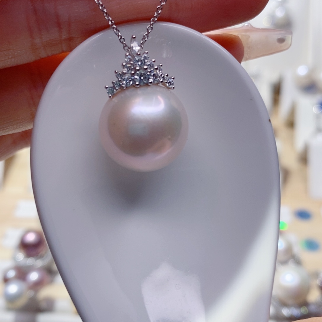 淡水珍珠吊坠(赠链)银S925镶嵌咯****?