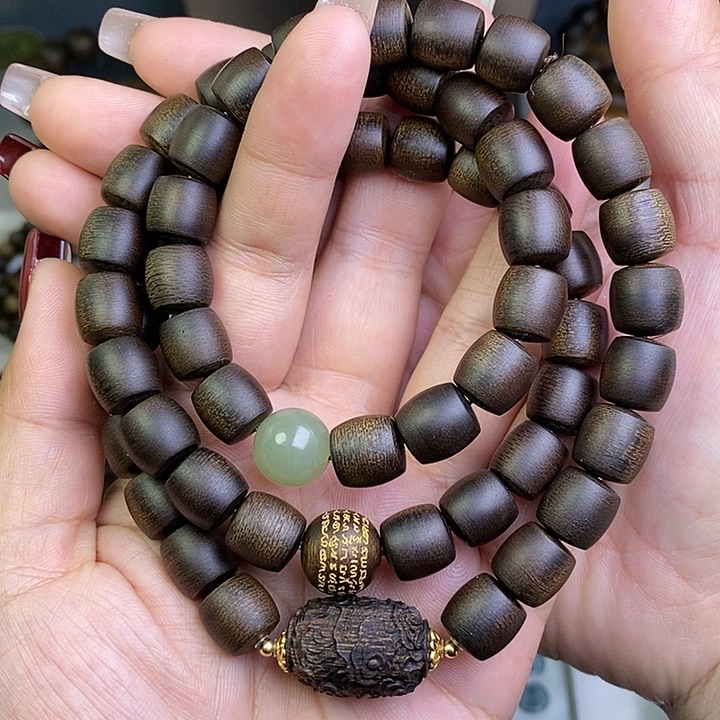 沉香手串一****n越南芽庄白棋楠玉化沉水