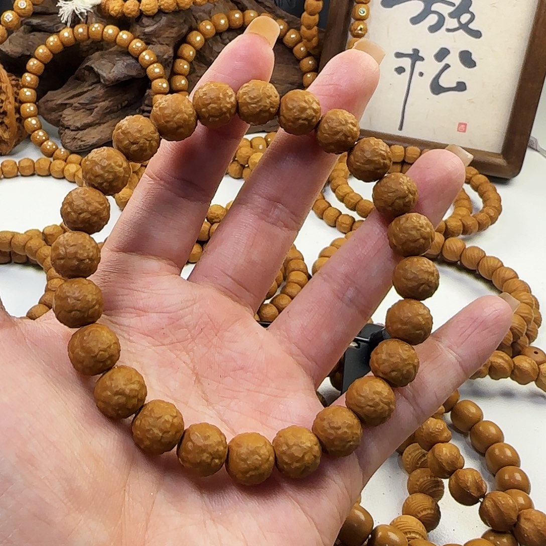 慕***风吊坠猴头核桃圆珠舍利卡10.2微瑕