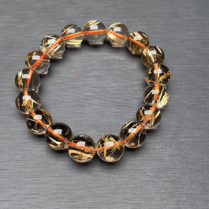 阿***凯未镶嵌发晶手串金钛晶