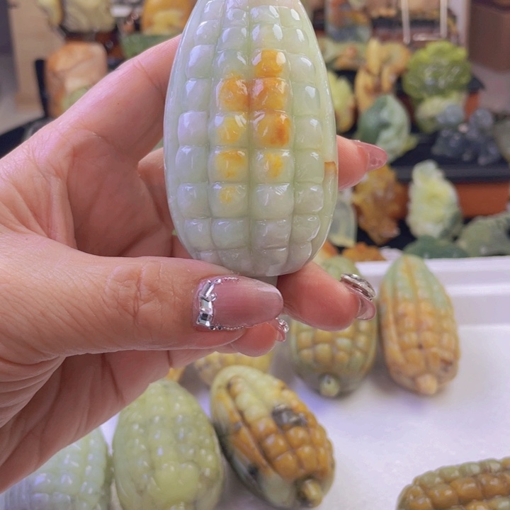 蛇纹石玉手把件合金盛**年