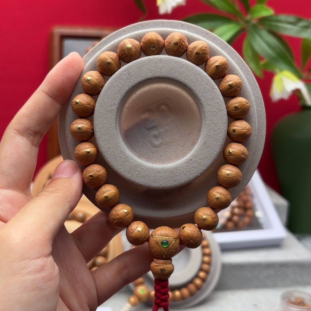 凤眼菩提手串12左右铜钉镶嵌手串