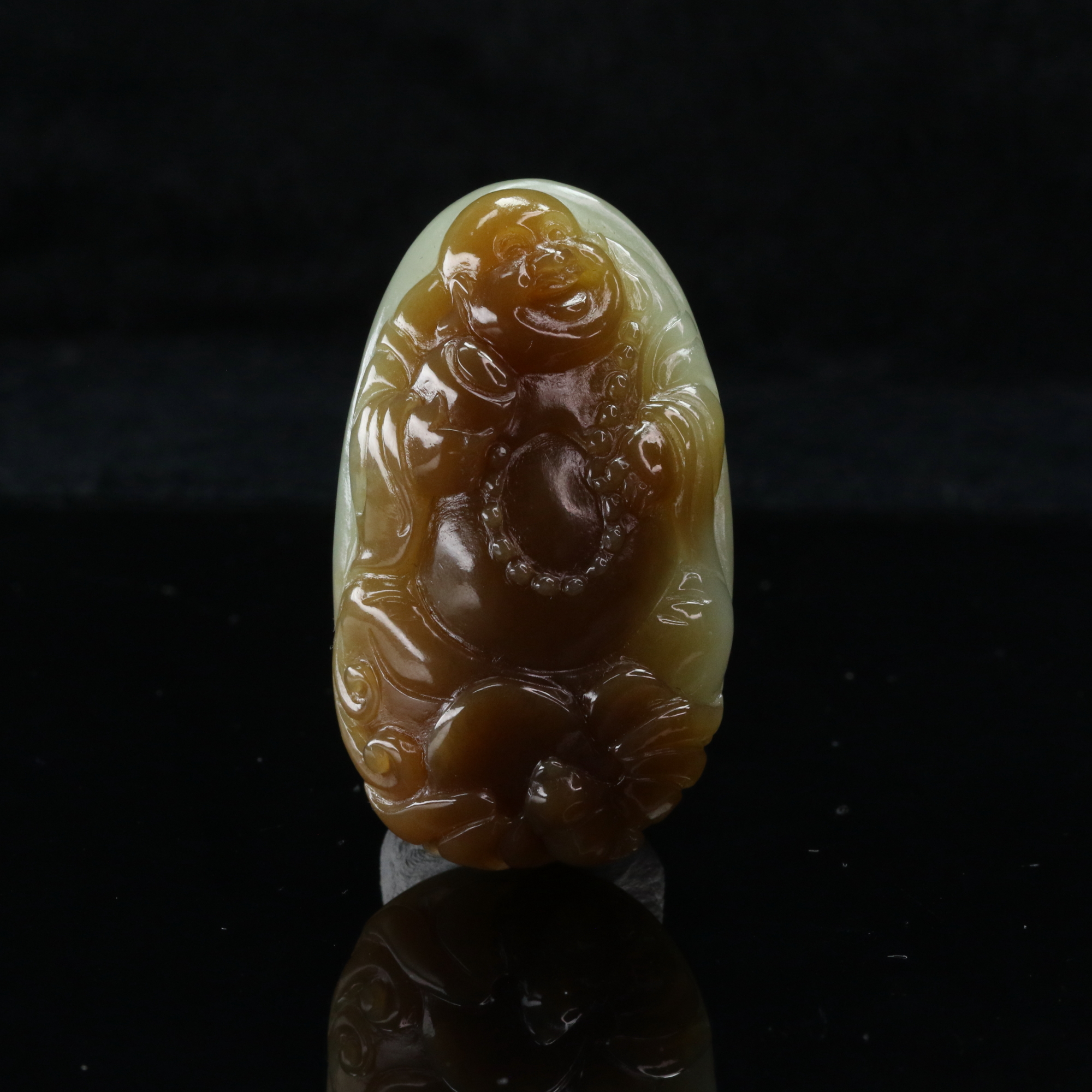 19和田玉且末红糖佛吊坠/300230上海嘉禾拍卖