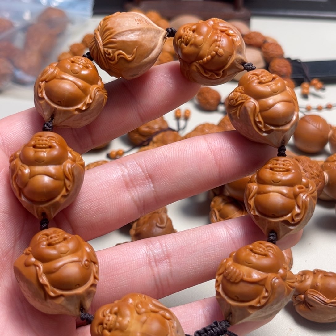 橄榄核吊坠大****来包衣弥勒