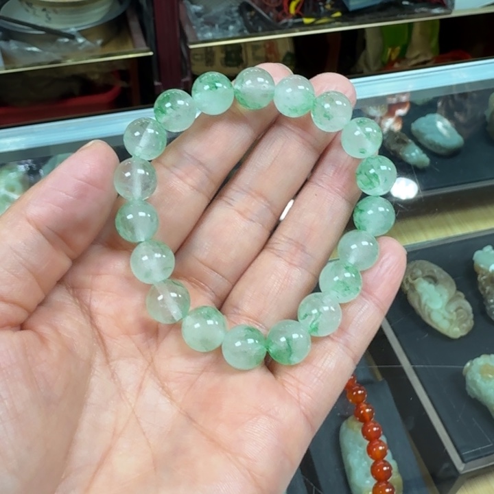 沁***雨石英质玉合金颈饰