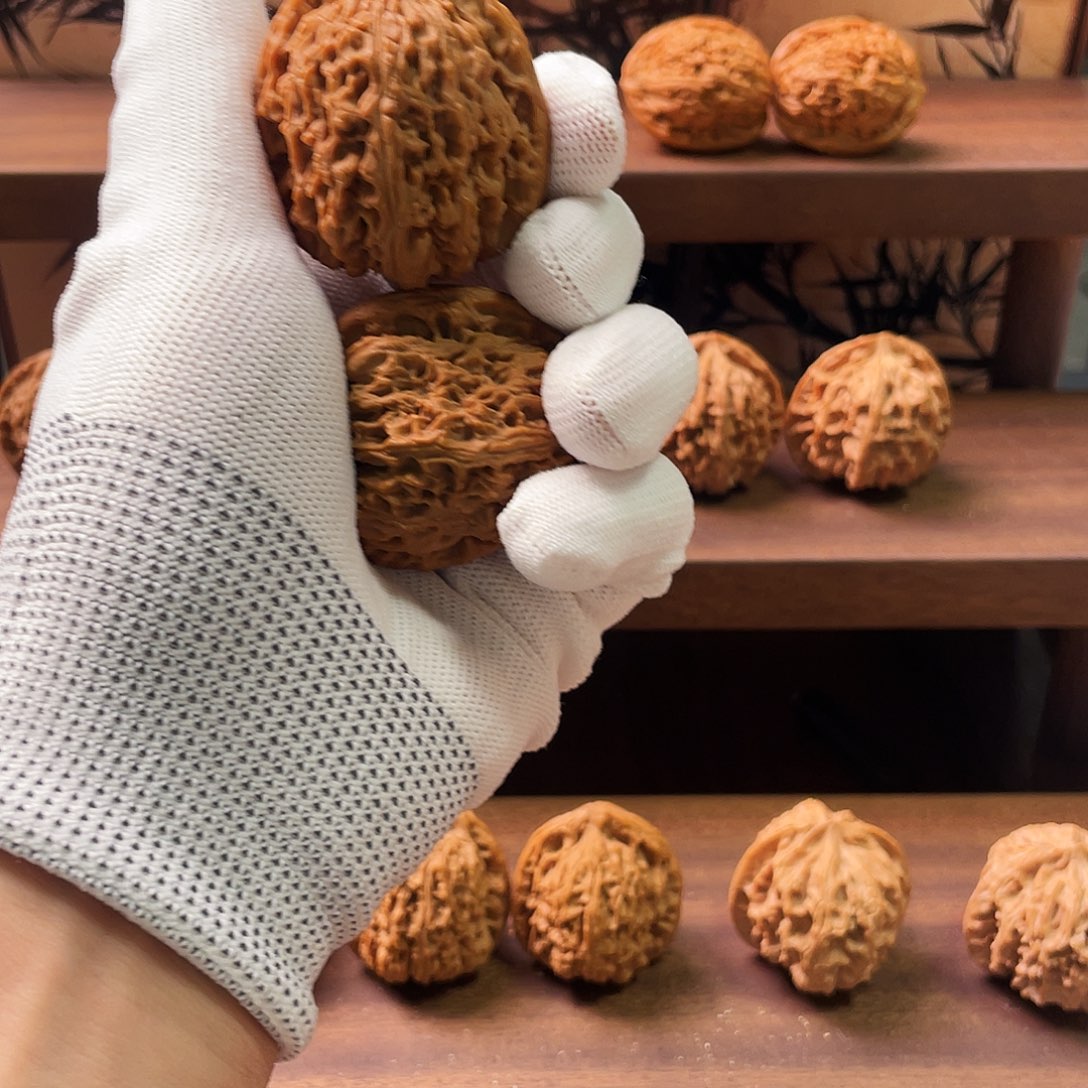 刚***草文玩核桃吊坠南疆石