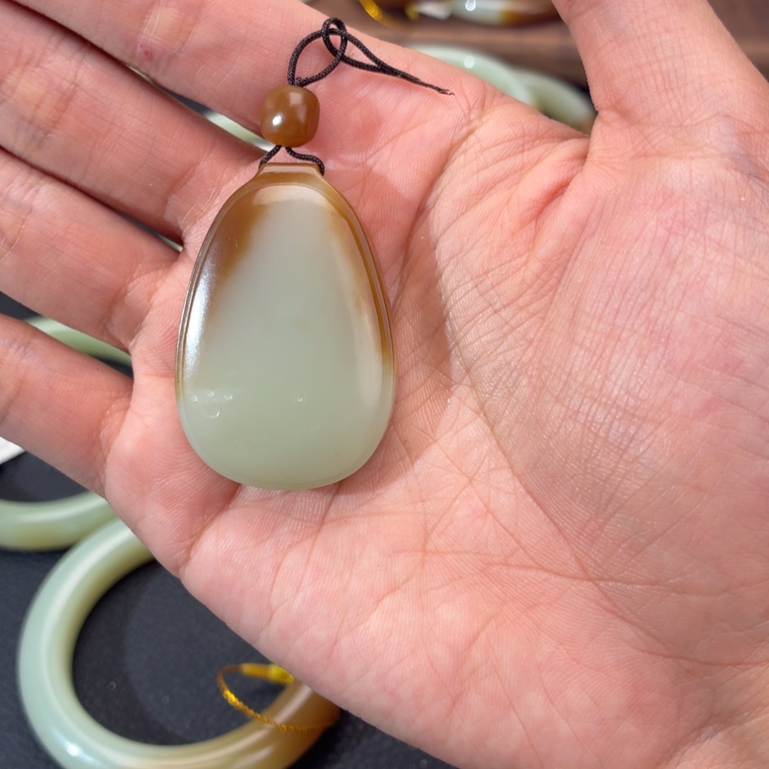 噶***哩和田玉（糖玉）未镶嵌戒指