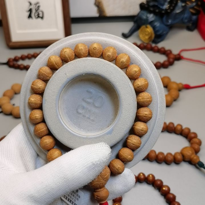 凤眼菩提手串商***说尼泊尔凤眼菩提11.5实心